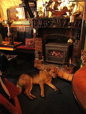 Relaxing in front of the fire at the Admiral Benbow pub, Penzance