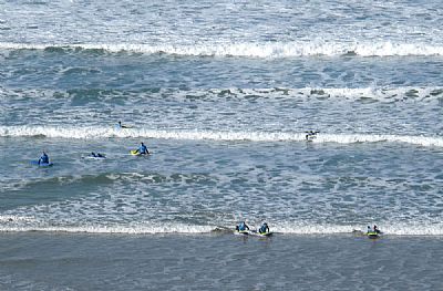 Learning how to surf at Watergate Bay