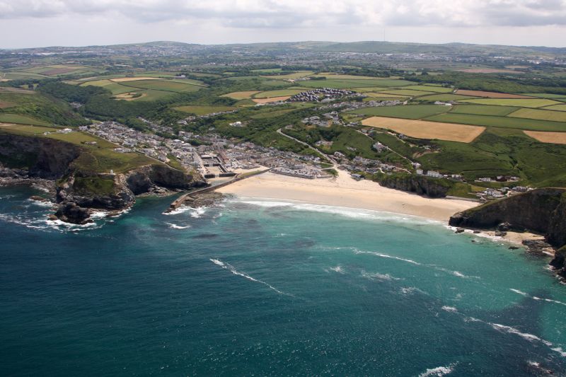Portreath Beach and harbour with Western Hill