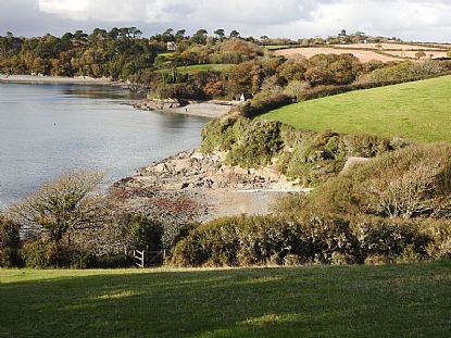 Porthallack Beach in the foreground and Porth Saxon Beach Beyond