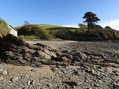 Porthallack Beach with Toll Point in the Background