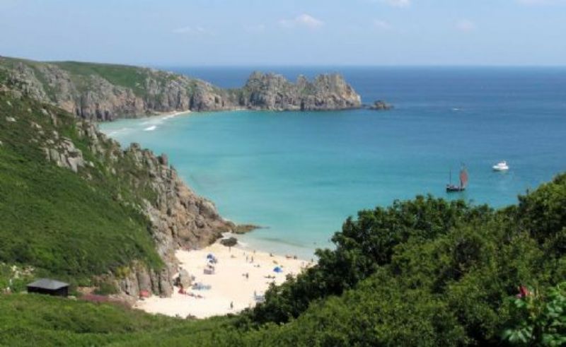 Treryn Dinas with Porthcurno Beach in the foreground