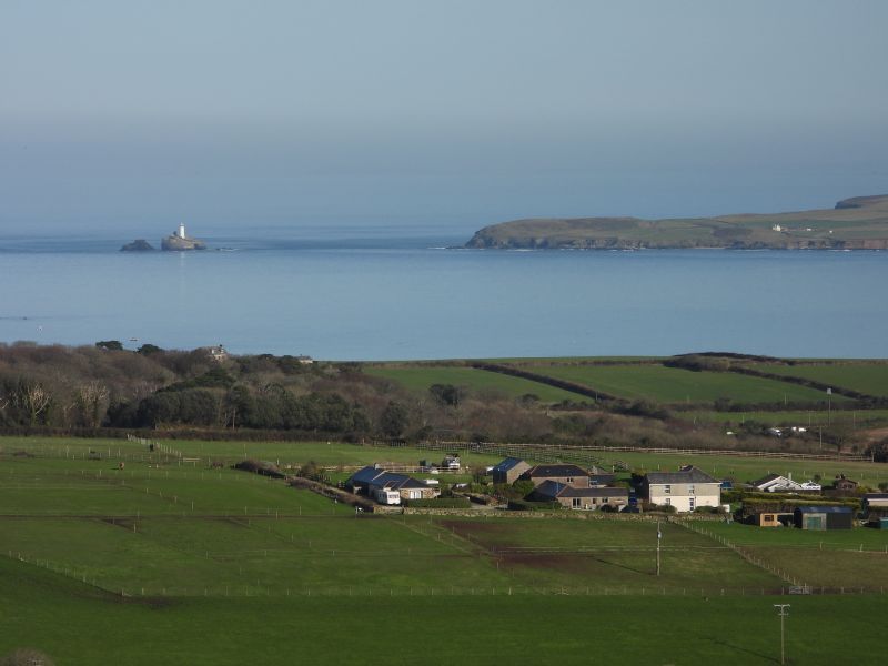 View of Godrevy Lighthouse in St Ives Bay from Trencrom Hill View of Godrevy Lighthouse in St Ives Bay from Trencrom Hill