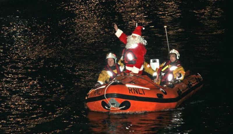 Santa arriving at St Ives  (St Ives in December)